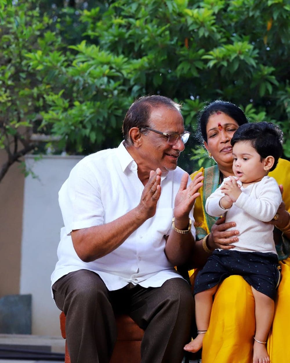Grandparents enjoying time with their grandchild