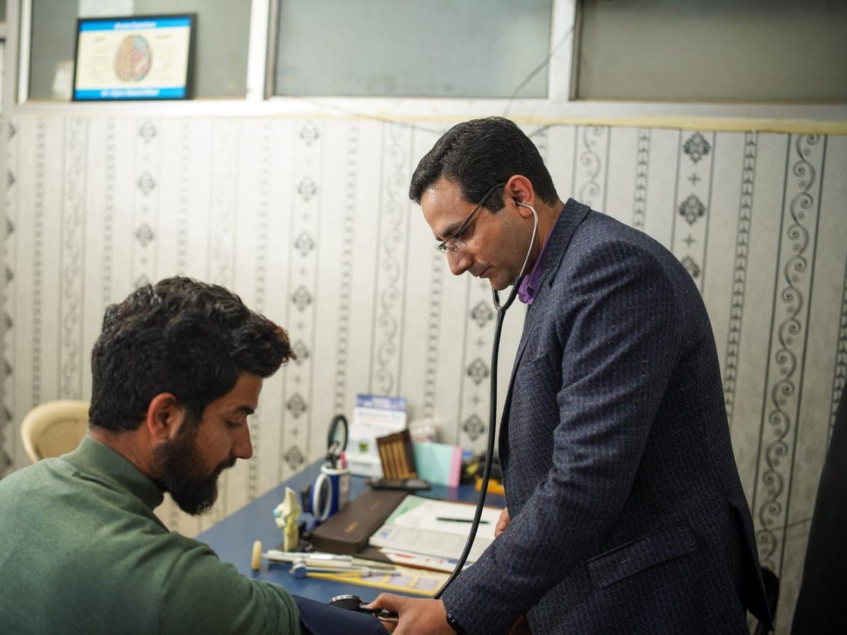 Doctor examining a patient in a clinic